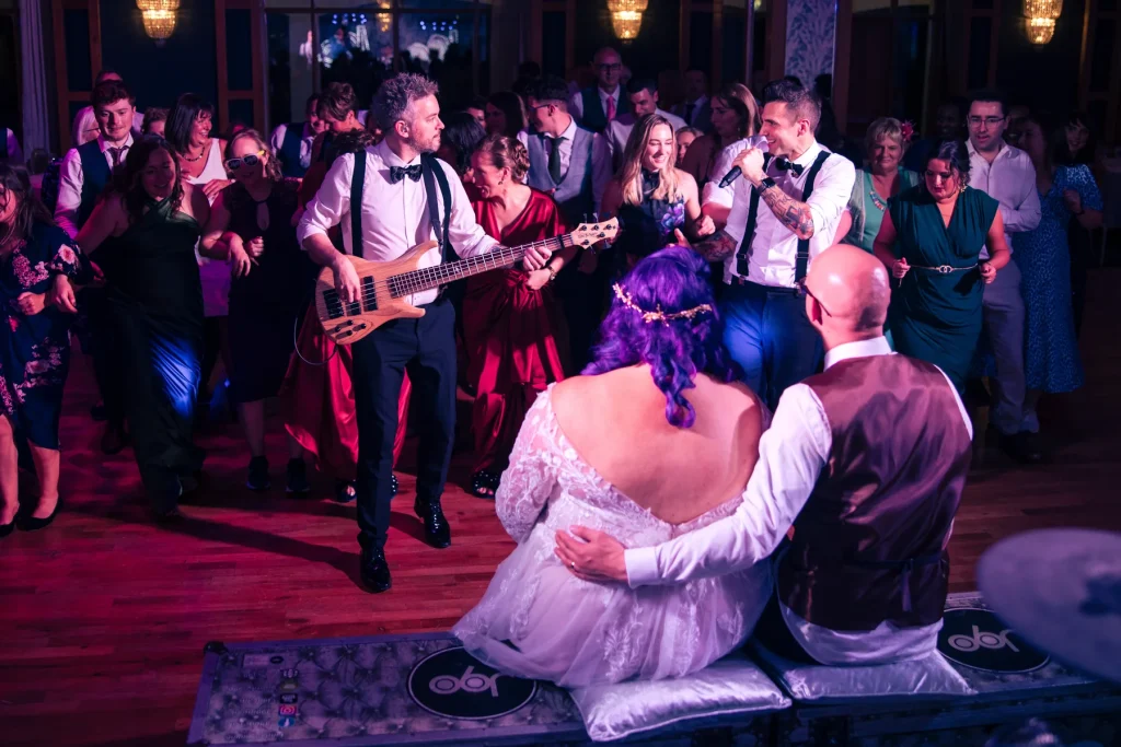 J90 wedding band performing at a wedding celebration